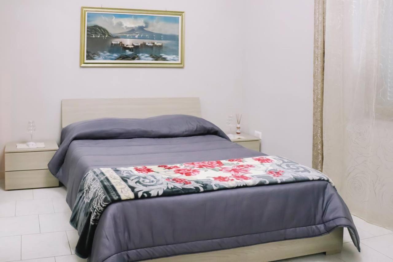 Holiday-Caroline Apartment ปอมเปอี ภายนอก รูปภาพ